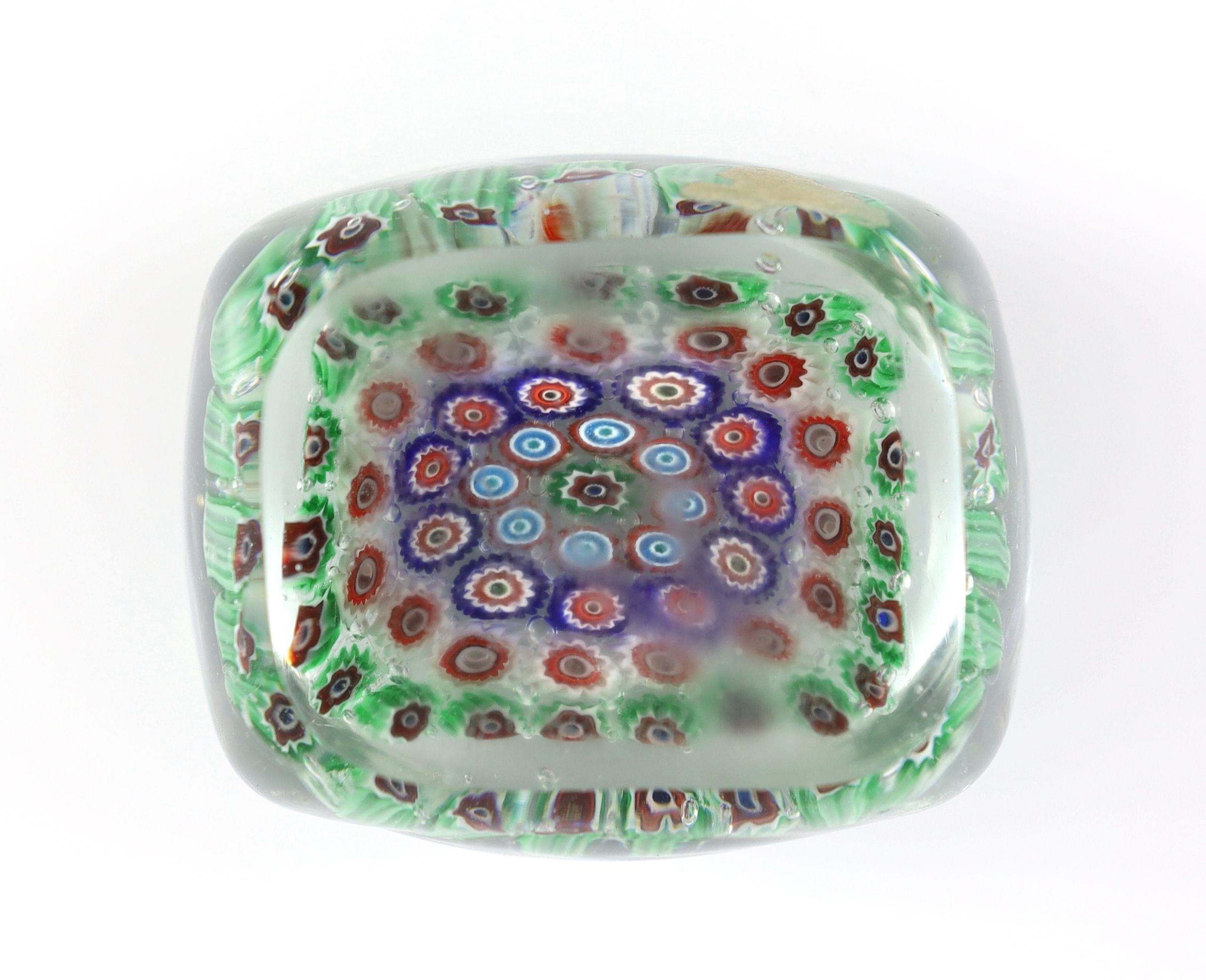 An unusual rectangular millefiori glass paperweight, probably Murano, 9.4cm